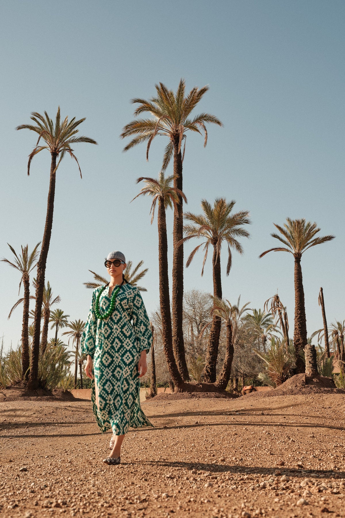 The green ikat pattern and hand embroidery of the Kleed Dorcas Green Kaftan, kaftan loungewear