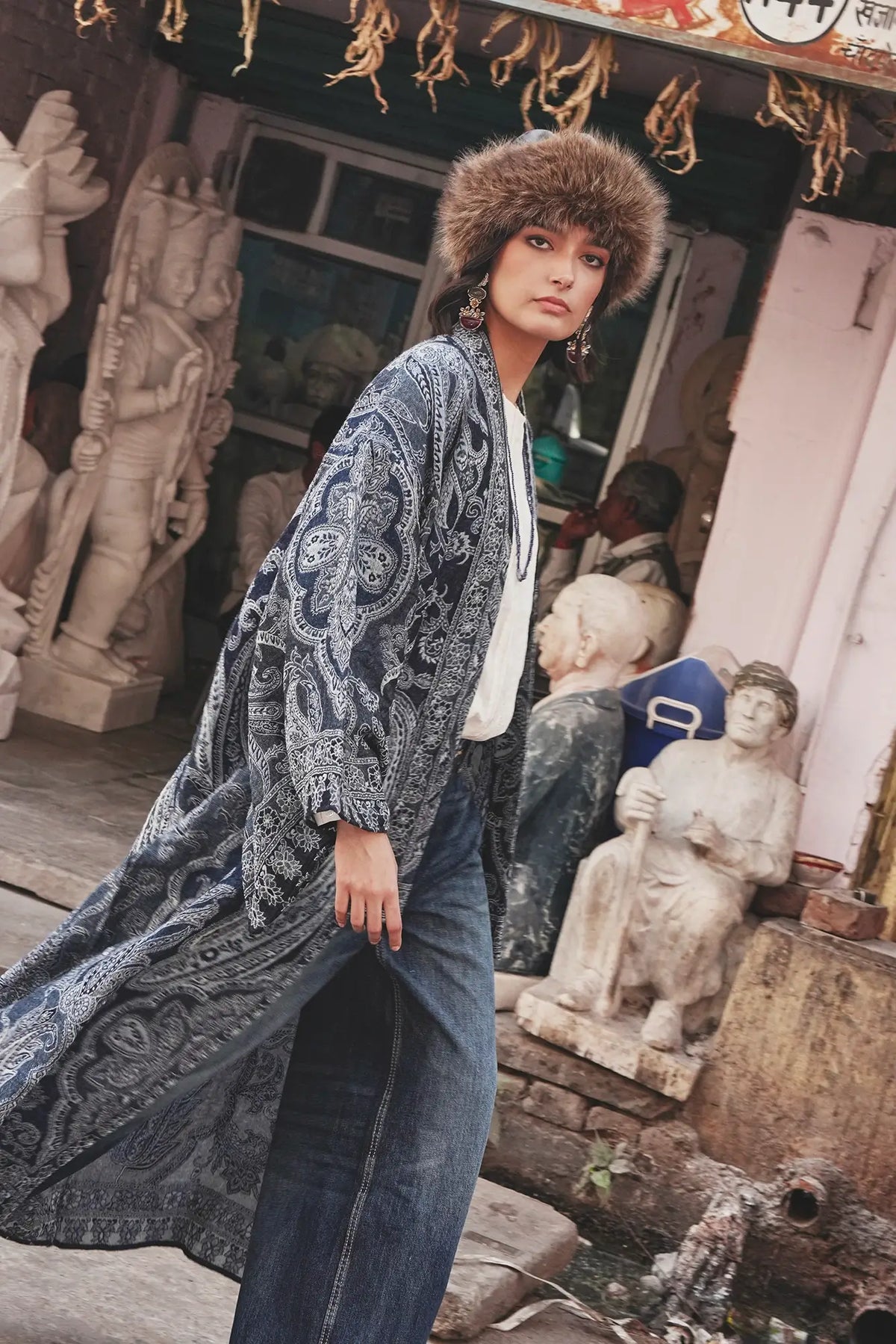 Kleed Blue Paisley Kimono Coat in wool, long fluid silhouette in indigo paisley print, styled with jeans.