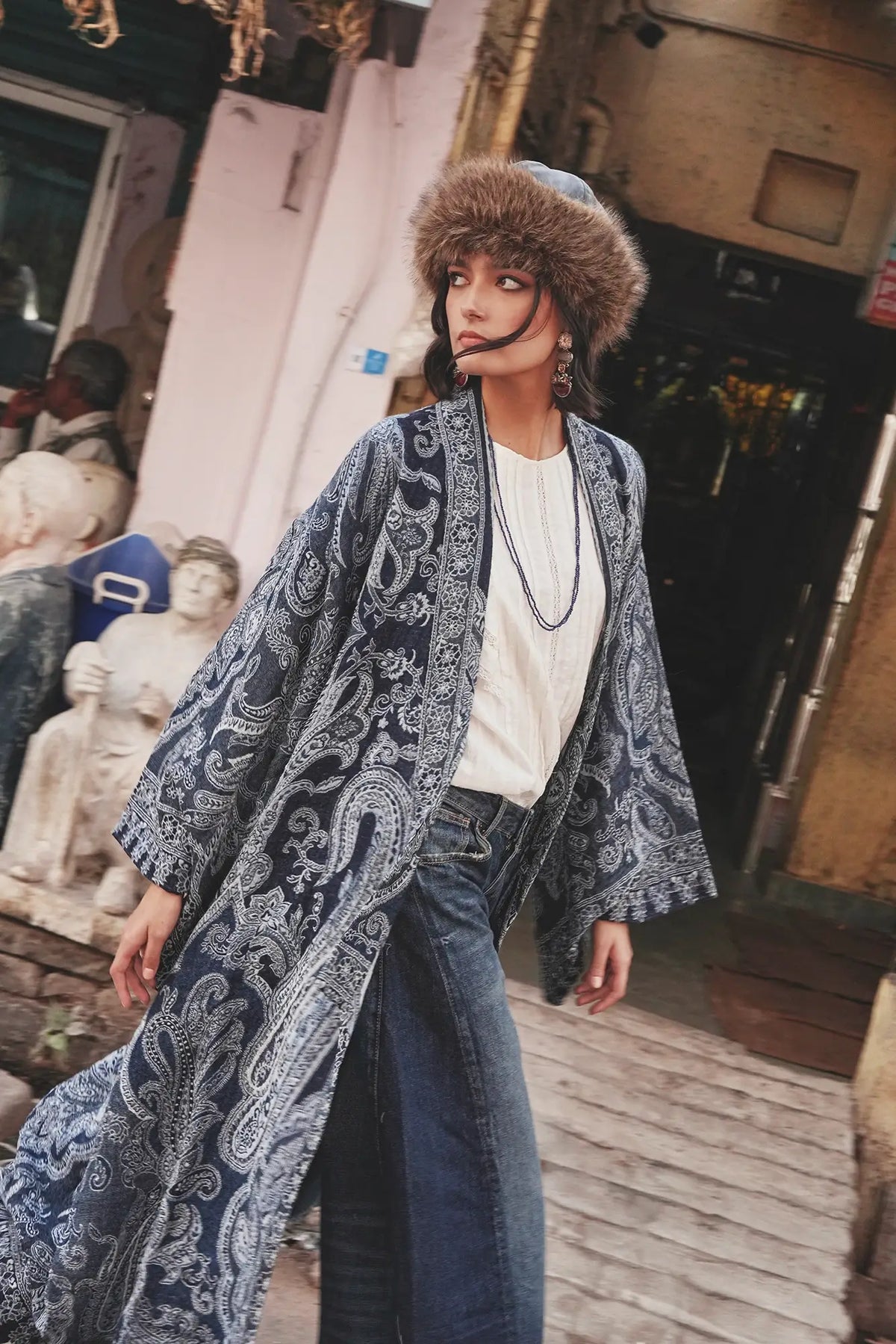 Kleed Blue Paisley Kimono Coat in pure wool, close view showing intricate indigo paisley detailing on the fabric.