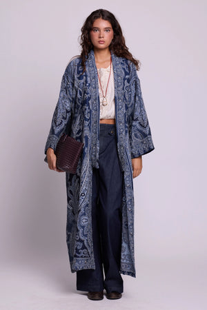 Front view of Kleed Blue Paisley Kimono Coat in 100% wool with indigo blue paisley print and balloon sleeves.