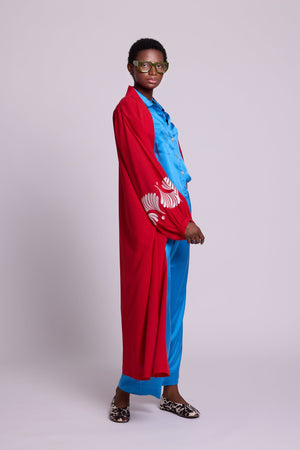 Full length view of Kleed Red Kandy Kimono in 100% cotton, balloon sleeves with hand-embroidered white silk cuffs.