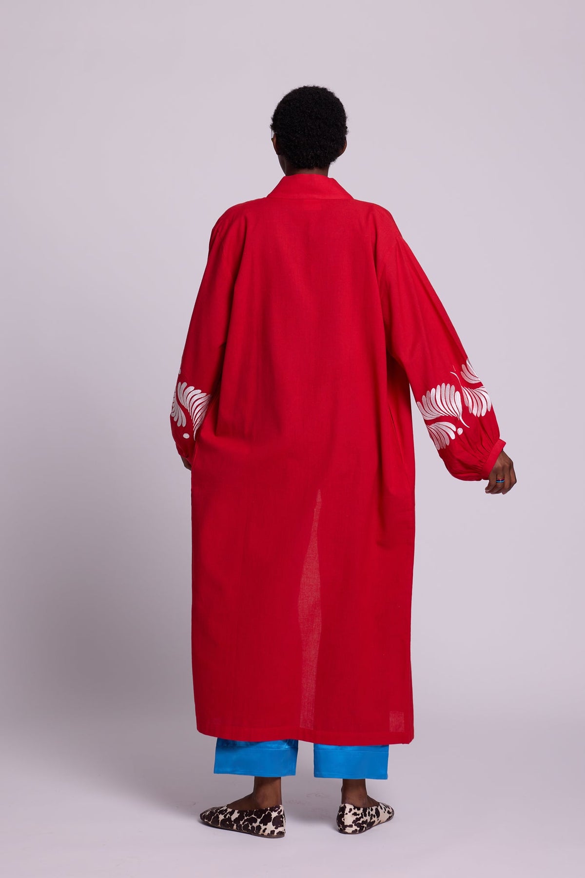 Back view of Kleed Red Kandy Kimono, long cotton kimono with balloon sleeves and embroidered cuff detail.