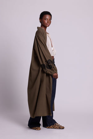 Kleed Olive Kandy Kimono in khaki cotton with black floral embroidery on balloon sleeve cuffs, longline cut.