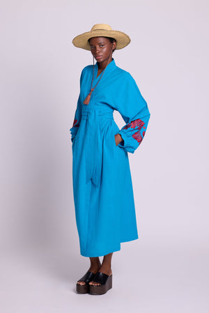 Kleed Sky Blue Kandy Kimono in cotton with balloon sleeves, red silk embroidery on cuffs and wrap belt.