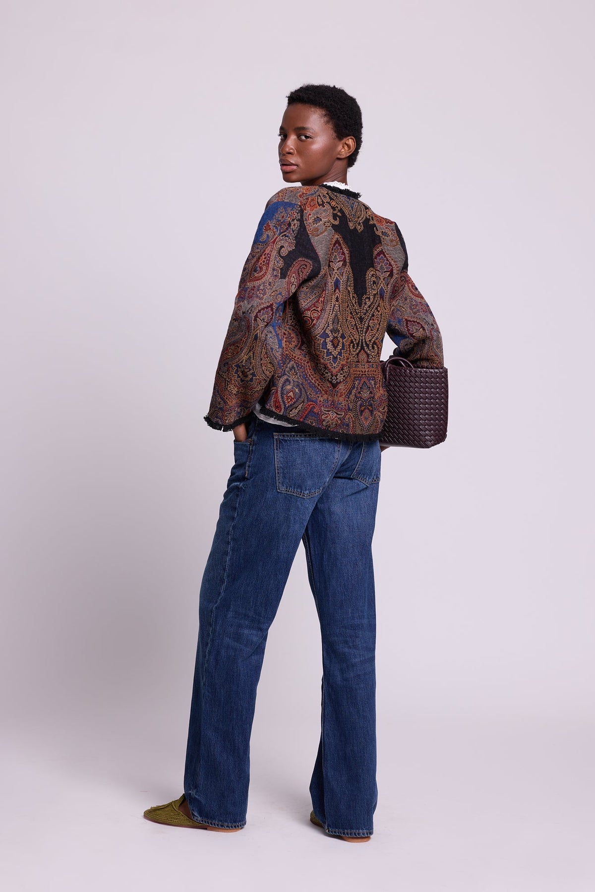 Kleed Blue Oak Jacket in pure wool with paisley swirls and cropped silhouette, styled with a white top.