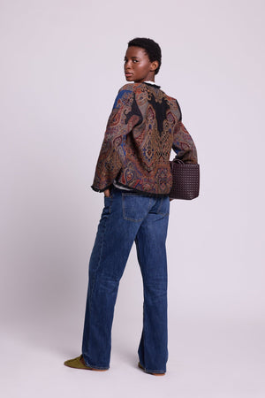 Kleed Blue Oak Jacket in pure wool with paisley swirls and cropped silhouette, styled with a white top.