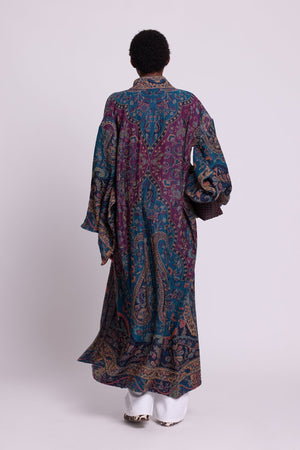 Back view of Kleed Fuchsia Paisley Kimono Coat in 100% wool with paisley print, balloon sleeves and tie belt.
