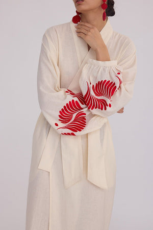 Close up of red floral hand embroidery on balloon sleeve cuffs of Kleed Natural Kandy Kimono in 100% cotton