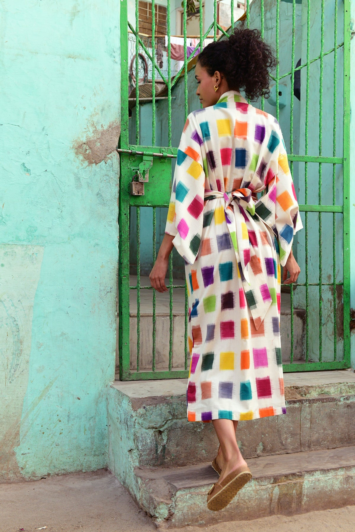 Back view of Baarish Ikat Kimono by KLEED — handloomed 100% cotton maxi kimono with multicolour ikat squares and tie belt