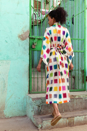Back view of Baarish Ikat Kimono by KLEED — handloomed 100% cotton maxi kimono with multicolour ikat squares and tie belt