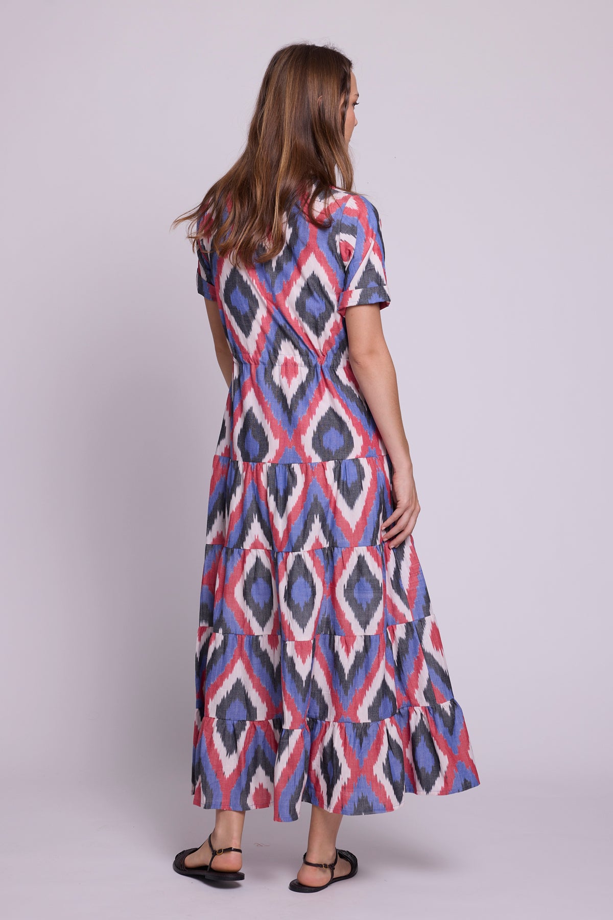 Back view of Bahu Bikaner Dress by KLEED — handloomed ikat cotton maxi dress in blue, red and 