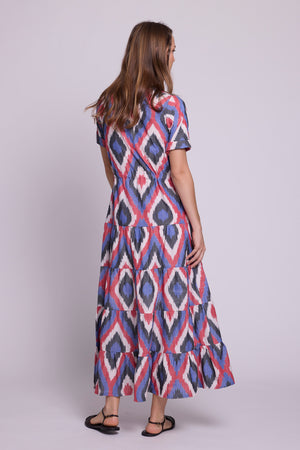 Back view of Bahu Bikaner Dress by KLEED — handloomed ikat cotton maxi dress in blue, red and 