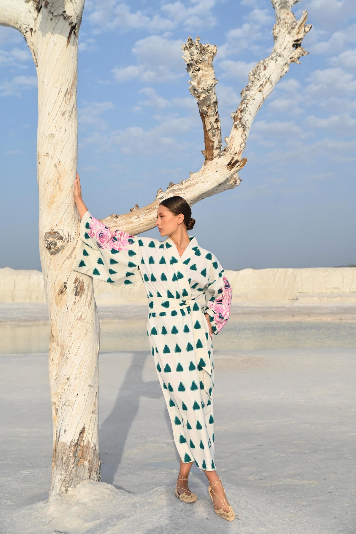Kleed Naya Kimono handloomed Ikat cotton natural colour emerald triangle pattern pink hand embroidered sleeves outdoor editorial shoot