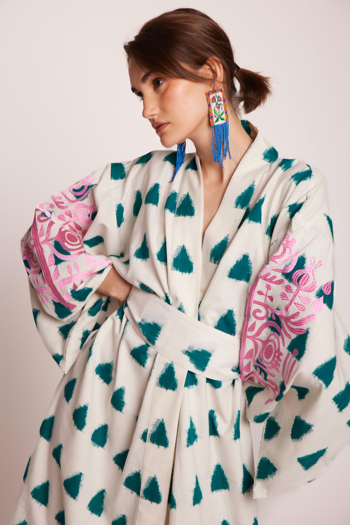 Kleed Naya Kimono in handloomed Ikat cotton natural colour with emerald triangle pattern and pink embroidered sleeves
