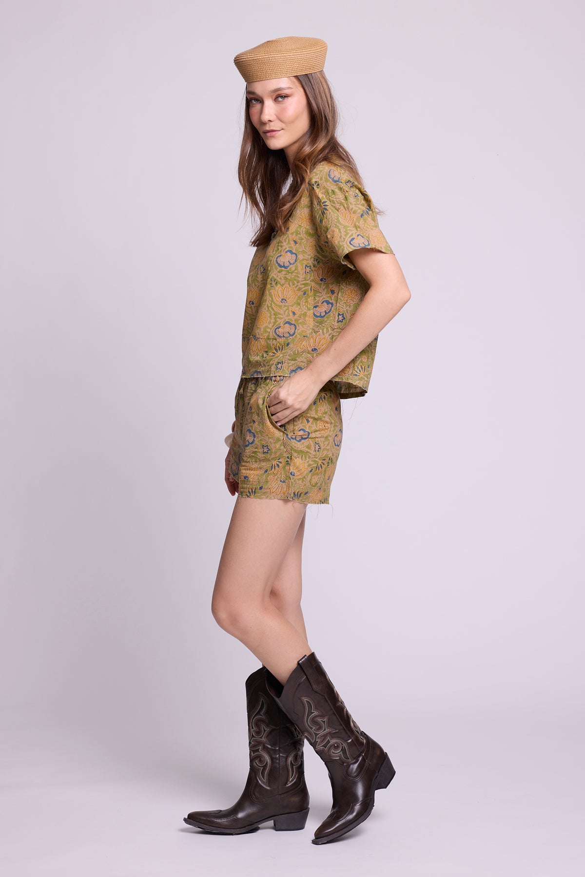 Side view of KLEED Kaner Jasmine Pyjama — hand block printed cotton set in olive floral, elasticated shorts

