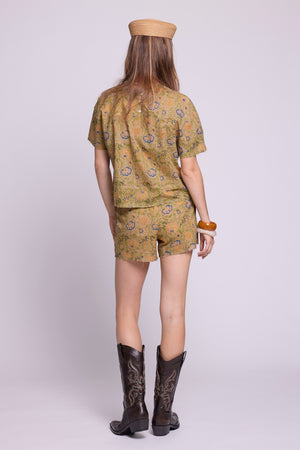 kaner_jasmine_pyjama_kleed_set_back
Alt text: Back view of Kaner Jasmine Pyjama by KLEED — hand block printed sustainable cotton pyjama set in olive green