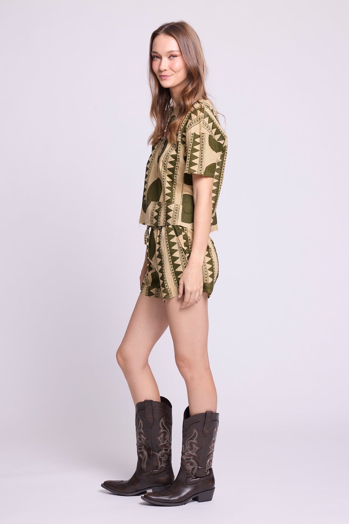 Side view of KLEED Kaner Khaki Geo Pyjama — sustainable cotton set with oversized circle geometric print
