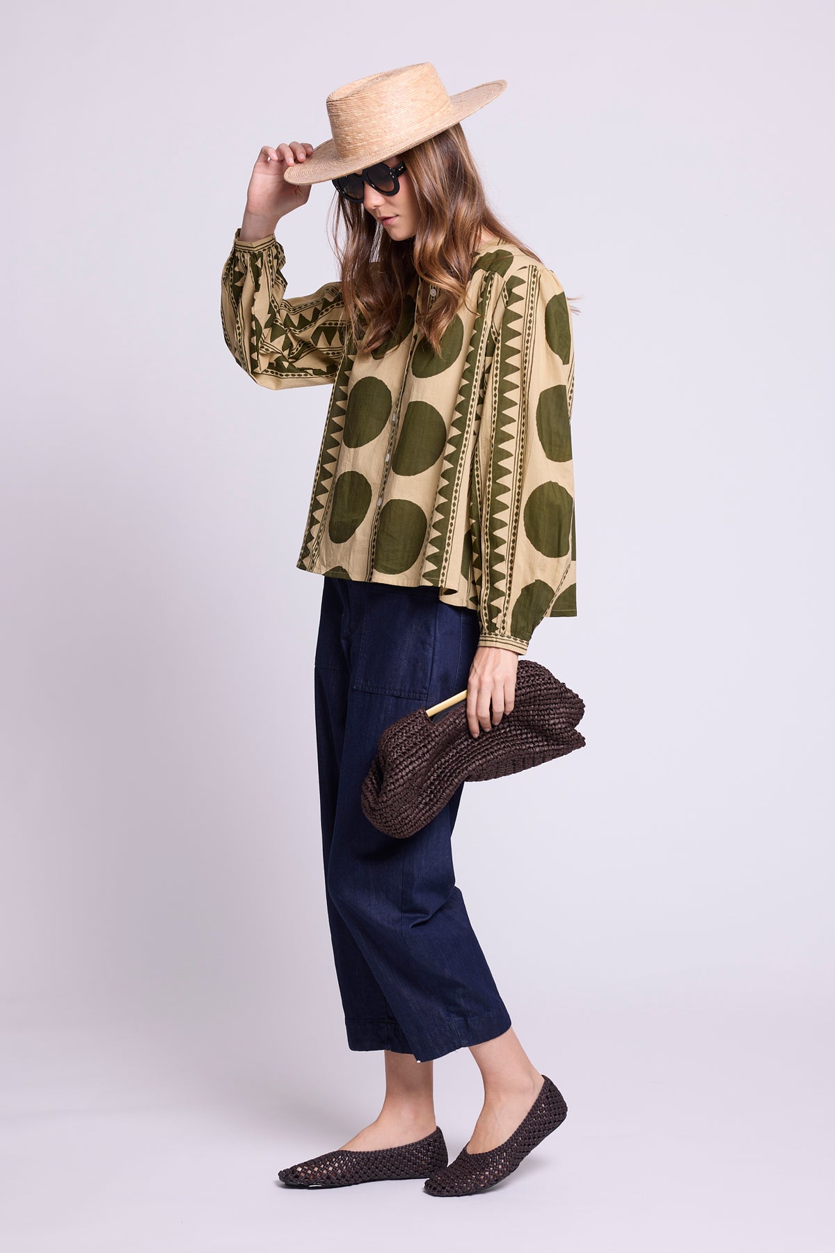 Model wearing the KLEED Khaki Geo Balloon Shirt in 100% cotton, side view showing the relaxed fit and voluminous balloon sleeves.