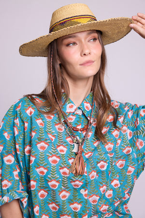 Close-up of KLEED Mogra Turquoise Pyjama — hand block printed 100% cotton in teal with floral motifs in coral and white