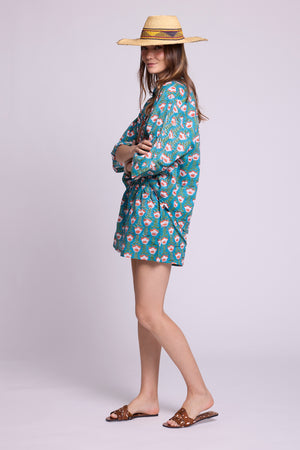 Side view of Mogra Turquoise Pyjama by KLEED — hand block printed 100% cotton set in teal with coral and white floral print