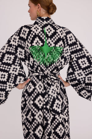 Close up sleeve detail of Kleed Mombasa Black Kimono in handloomed Ikat cotton black and white geometric pattern