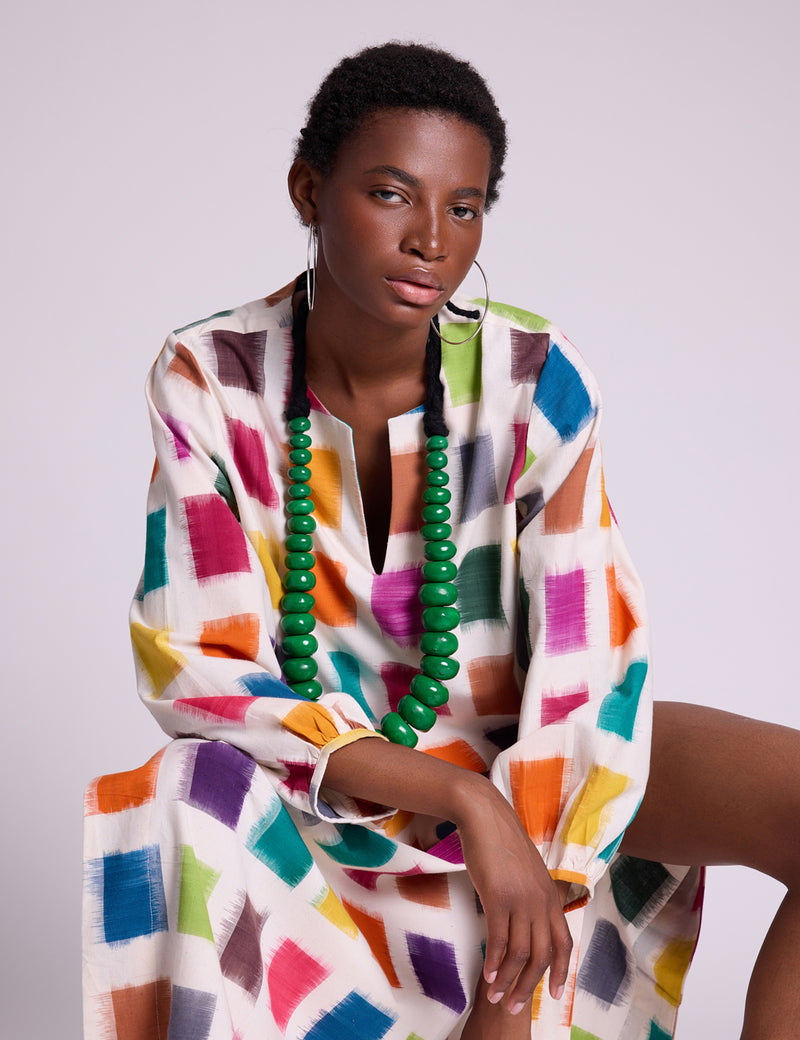 Woman wearing KLEED Nagar Squares Kaftan, handloomed ikat cotton, sustainable luxury resortwear
